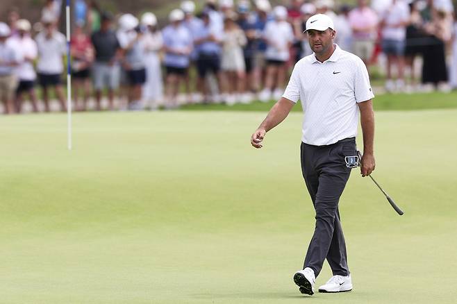 MCKINNEY, TEXAS - MAY 23: Scottie Scheffler of the United States reacts while playing the 14th hole during the third round of THE CJ CUP Byron Nelson 2026 at TPC Craig Ranch on May 23, 2026 in McKinney, Texas. (Photo by Mike Mulholland/Getty Images for The CJ Cup)