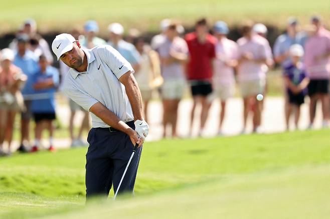 MCKINNEY, TEXAS - MAY 24: Scottie Scheffler of the United States plays a shot on the 14th hole during the final round of THE CJ CUP Byron Nelson 2026 at TPC Craig Ranch on May 24, 2026 in McKinney, Texas. Sam Hodde/Getty Images/AFP (Photo by Sam Hodde / GETTY IMAGES NORTH AMERICA / Getty Images via AFP)
Getty Images for The CJ Cup