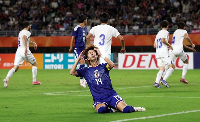 Asian Games - Aichi-Nagoya 2026 - Football Men Semi-Finals - Japan v Uzbekistan - Nagai Stadium, Osaka, Japan - September 30, 2026 Japan's Yuto Ozeki reacts REUTERS/Andrew Boyers<저작권자(c) 연합뉴스, 무단 전재-재배포, AI 학습 및 활용 금지>